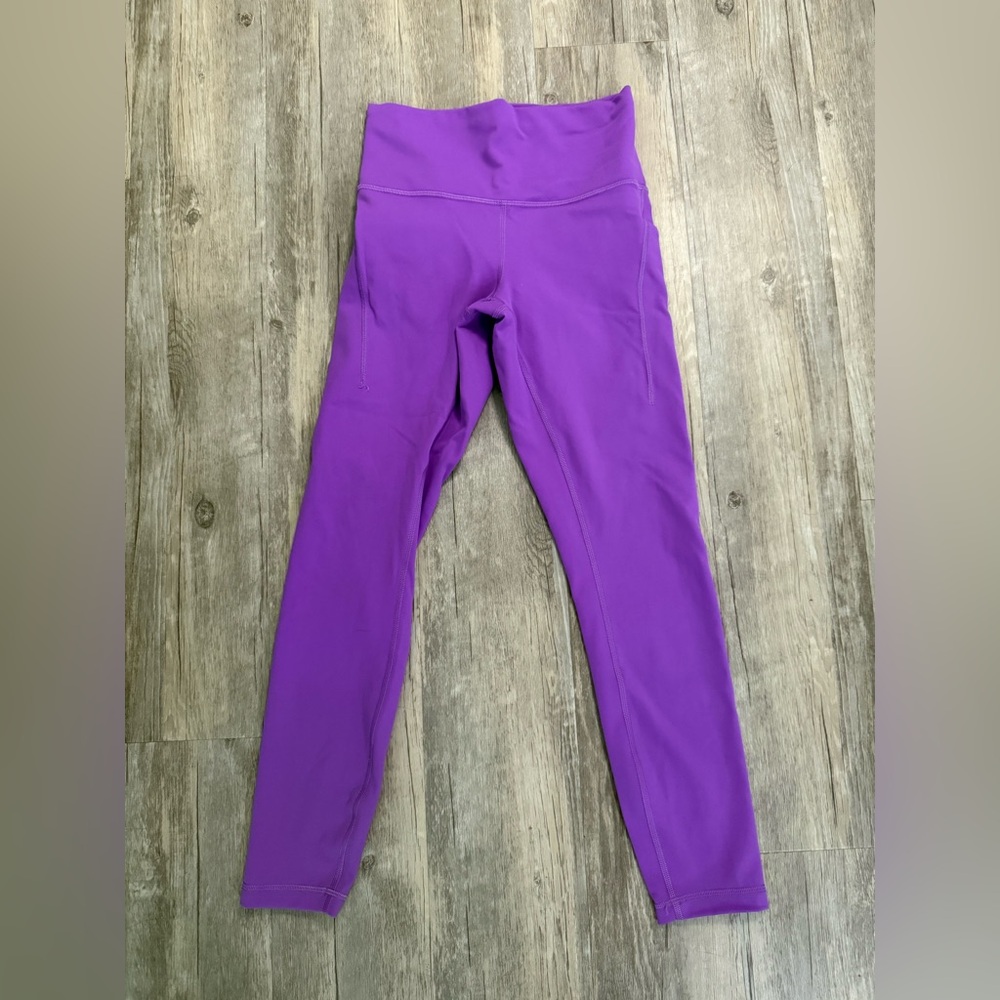 Lululemon Wunder Train High-Rise with Pockets 25"
Moonlit Magenta size‎ 6
